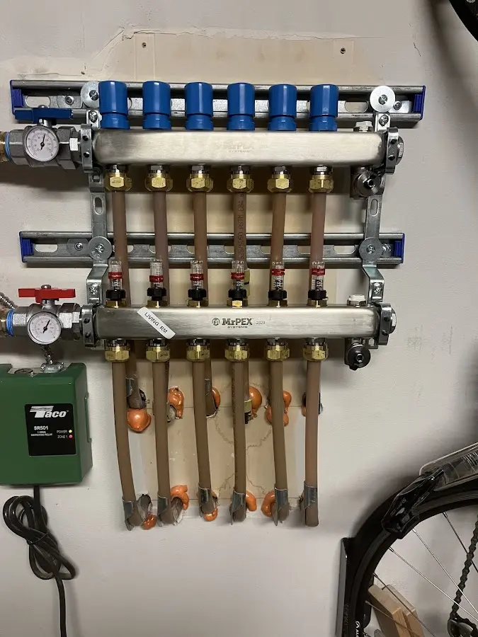 Plumber performing Gas Line Installation at a residential property in Eldersburg